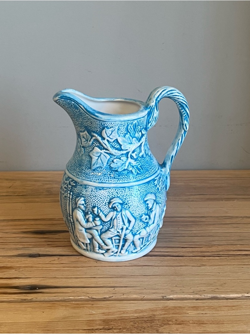 Vintage blue and white water pitcher with a Meissen style design